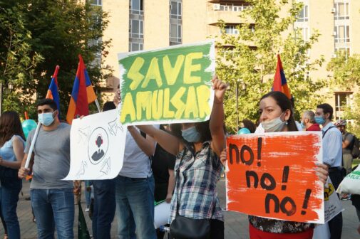 Men and women marching in protest against Amulsar gold mining project in Armenia