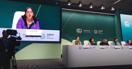 Andrea Echeverri of GFC speaking at a press conference at the climate change conference in baku, with other speakers on stage