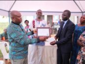 Frank Murazumi recieving an award on behalf of NAPE Uganda